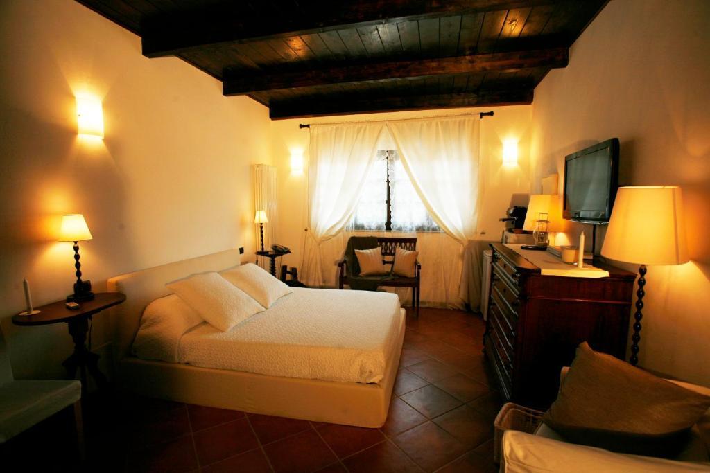 Castel Rocchero La Maraglianaアパートホテル 部屋 写真