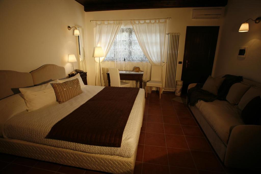 Castel Rocchero La Maraglianaアパートホテル 部屋 写真