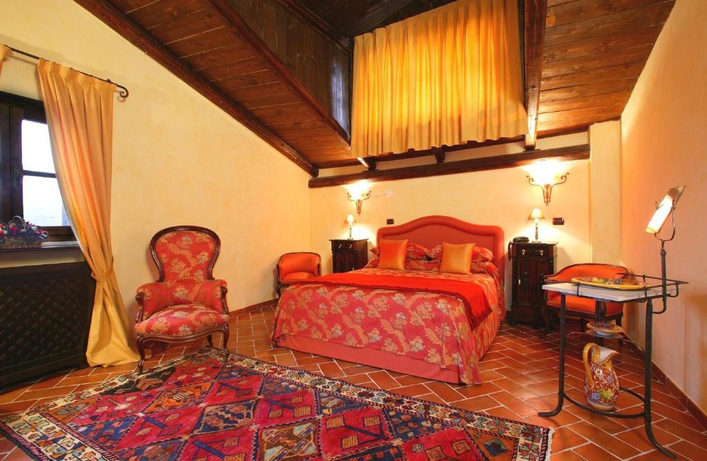 Castel Rocchero La Maraglianaアパートホテル 部屋 写真